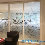 Bespoke frosted window film (AR01) for the meeting room office giving partial privacy