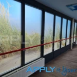 Bespoke frosted window film with beach, dunes, grasses, giving privacy and block view, outside, AR02