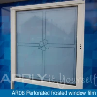 Perforated frosted window film with a custom printed design, front-side, outside